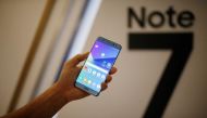 A model poses for photographs with a Galaxy Note 7 during its launch ceremony in Seoul, South Korea, August 11, 2016. Reuters/Kim Hong-Ji/File Photo