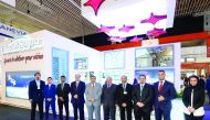 Es’hailSat officials at their booth at the exhibition.