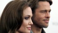 Angelina Jolie and Brad Pitt. REUTERS/Carlo Allegri/File Photo
