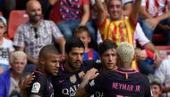 Barcelona's Luis Suarez (2nd L) celebrates his goal with teammates. REUTERS/Eloy Alonso