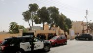 Jordanian police stand guard in front of a hospital where the body of Jordanian writer Nahed Hattar, who was shot dead, was held in Amman, Jordan, September 25, 2016. REUTERS/Muhammad Hamed