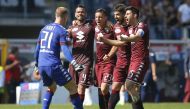 Torino's players celebrate at the end of the Italian Serie A football match between Torino and AS Roma at the 
