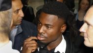 Paris Saint-Germain's defender Serge Aurier arrives to the Paris courthouse early on September 26, 2016 to answer a charge of elbowing a police officer.  AFP / PATRICK KOVARIK