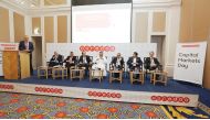 Ooredoo Group Deputy CEO Waleed Al Sayed (centre) and other officials at the Capital Markets Day in Doha.
