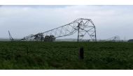A photo taken on September 28 and obtained on September 29, 2016, shows transmission towers carrying power lines, toppled by high winds near Melrose in South Australia. Australia on Thursday after 