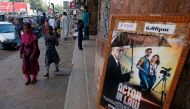 An advertising poster for a Pakistani film with Indian actors is seen outside a movie theater in Karachi, Pakistan, September 30, 2016. Reuters/Akhtar Soomro