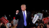 Republican presidential nominee Donald Trump holds a rally with supporters at the Suburban Collection Showplace in Novi, Michigan, U.S. September 30, 2016. REUTERS/Jonathan Ernst
