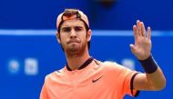 Karen Khachanov of Russia gestures after a point against Feliciano Lopez of Spain during their men's singles quarter-final match at the Chengdu Open ATP tennis tournament in Chengdu, southwest China's Sichuan province on September 30, 2016. China OUT
/ A
