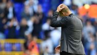 Manchester City's Spanish manager Pep Guardiola reacts after the English Premier League football match between Tottenham Hotspur and Manchester City at White Hart Lane in London, on October 2, 2016.  AFP / Glyn KIRK