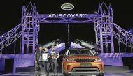 Senior officils of Land Rover posing with the company’s All-New Discovery seven-seat SUV that broke a Guinness World Record for the largest LEGO structure ever built.
