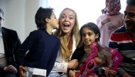 American actress Lindsay Lohan visits a Syrian family living in the Sultanbeyli district of Istanbul, Turkey on October 4, 2016. Famous American actress Lindsay Lohan gave presents to the children during her visit. ( ?ebnem Co?kun - AA )