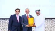 Halul Offshore Services Co officials with the award.