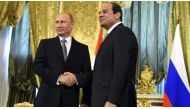 Russian President Vladimir Putin (L) shakes hands with his Egyptian counterpart Abdel Fattah al-Sisi during their meeting in Moscow. (AP)