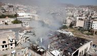 Smoke rises from the community hall in Sanaa, the capital of Yemen. (Reuters/Khaled Abdullah/File Photo)