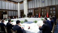 ANKARA, TURKEY - OCTOBER 11: Turkish President Recep Tayyip Erdogan (rear C) attends an Iftar dinner for Muharram month with Turkish Prime Minister Binali Yildirim at the Presidential Complex in Ankara, Turkey on October 11, 2016. 