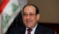 Nuri al-Maliki speaks during an interview with Reuters in Baghdad January 12, 2014. (REUTERS/Thaier Al-Sudani)