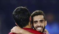 Qatar’s Hassan Al Haydos (right) celebrates his goal against Syria during the 2018 World Cup qualifier at the Jassim Bin Hamad Stadium, Doha. Qatar won 1-0.