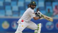 Pakistani batsman Azhar Ali plays a shot on the opening day of the first day-night Test between Pakistan and the West Indies at the Dubai International Cricket Stadium in the Gulf Emirate on October 13, 2016. (AFP / Aamir Qureshi)