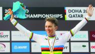 Denmark’s gold medallist Jakob Egholm celebrates on the podium at the end of the men’s juniors road race event of the UCI Road World Championships 2016 in Doha yesterday.