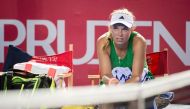 Caroline Wozniacki of Denmark rests after her women's singles semi-finals match against Jelena Jankovic of Serbia at the Hong Kong Open tennis tournament on October 15, 2016. / AFP / Jayne RUSSELL