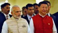 Indian Prime Minister Narendra Modi (L) and Chinese President Xi Jinping arrive for a photo opportunity ahead of BRICS (Brazil, Russia, India, China and South Africa) Summit in Benaulim, in the western state of Goa, India, October 15, 2016. REUTERS/Danish