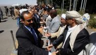 Members of the Houthi negotiating team who were stranded in Oman are welcomed upon the team’s arrival at the airport in Sanaa, Yemen, Oct. 15. (Reuters/Mohamed al-Sayaghi)