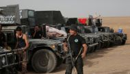 Iraq government's Anti-Teror teams, armoured vehicles and artillery are deployed in the Hazir region, southeast of Mosul during an Operation to retake Iraq's Mosul from Deash, on October 15, 2016, Nineveh, Iraq. ( Yunus Kele? - Anadolu Agency )
