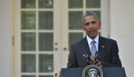 US President Barack Obama speaks during a joint press conference with Italian Prime Minister Matteo Renzi (not seen) in the Rose Garden at the White House in Washington, DC, October 18, 2016. / AFP / Nicholas Kamm
