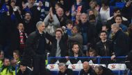 Manchester United's Portuguese manager Jose Mourinho (L) starts walking toward the tunnel at the final whistle of the English Premier League football match between Chelsea and Manchester United at Stamford Bridge in London on October 23, 2016. AFP / GLYN 