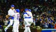 The Chicago Cubs celebrate after winning game six of the 2016 NLCS playoff baseball series at Wrigley Field in Chicago, IL, USA, on Saturday.