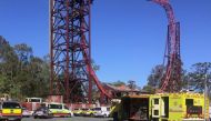 Emergency services vehicles can be seen outside the Dreamworld theme park at Coomera on the Gold Coast, Australia, October 25, 2016 after a number of people were reported killed on a ride at Australia's biggest theme park. AAP/Scott Bailey/via REUTERS