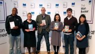 The six Man Booker shortlisted fiction authors, (L to R) Paul Beatty, Deborah Levy, Graeme Macrae Burnet, Ottessa Moshfegh, David Szalay and Madeleine Thien, pose with their books, during a photo-call on the eve of the prize giving in London, Britain Octo
