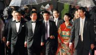 Japan's Prime Minister Shinzo Abe, (3rd L), accompanied by kimono-clad Japanese actress Haru Kuroki, arrive for the opening ceremony of the Tokyo International Film Festival in Tokyo, Japan October 25, 2016. (Kyodo/via REUTERS)