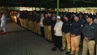 Pakistani policemen offer absentia funeral prayers for the victims of a militant attack on the Balochistan Police College, in Lahore on October 26, 2016. A militant organisation said October 26, it had worked with the Islamic State to carry out a huge rai