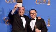 Writer/producer Alexander Rodnyansky (L) and director Andrey Zvyagintsev, winners of Best Foreign Language Film for 'Leviathan,' pose in the press room during the 72nd Annual Golden Globe Awards on January 11, 2015 in Beverly Hills, California (AFP Photo/