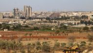 A general view shows an abandoned tank near a cement factory in the government-held Sheikh Said area on the southern outskirts of the northern embattled Syrian city of Aleppo, as Syrian government forces advance in the ongoing offensive to seize the rebel