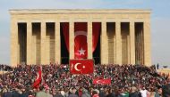 People wave Turkish flags at the Anitkabir, the mausoleum of the founder of Turkish Republic Mustafa Kemal Ataturk, during celebrations marking the 93rd Anniversary of Republic Day in Ankara on October 29, 2016 (AFP Photo/Adem Altan)