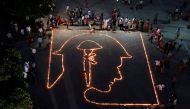 People light lamps arranged to form a tribute to fallen soldiers of the Indian Army, on the eve of Diwali, the Hindu festival of lights, in Chandigarh, India, October 29, 2016. REUTERS/Ajay Verma