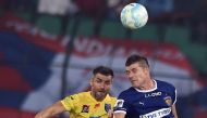 Chennaiyin FC's forward Davide Succi vies for the ball with Kerala Blaster FC's defender Aaron Hughes during the Indian Super League (ISL) football match between Chennaiyin FC and Kerala Blaster FC's at The Jwaharlal Nehru Athletic Stadium in Chennai on O