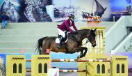 Qatar’s Ali Yousef Al Rumaihi clears a hurdle on the final day of Qatar International Show Jumping Championship at Qatar Racing and Equestrian Club in Doha in this January 2016 file photo.