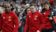 (L - R) Manchester United's Ashley Young, Wayne Rooney and Michael Carrick (Reuters / Carl Recine)