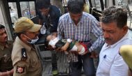 Indian volunteers and officials carry a two and a half year-old child Pari into The Government Medical College Hospital in Jammu on November 1, 2016, after he was injured in cross-border shelling in the disputed Himalayan region of Kashmir. AFP / STR