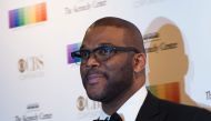 (FILES) This file photo taken on December 6, 2015 shows actor Tyler Perry on the red carpet before the 38th Annual Kennedy Center Honors in Washington, DC. 