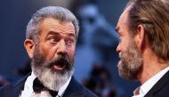 Director Mel Gibson (L) and actor Hugo Weaving attends the red carpet for the movie 