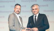 Gulf Air official receiving award.