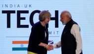 Britain's Prime Minister Theresa May shakes hands with her Indian counterpart Narendra Modi during the India-UK Tech Summit in New Delhi, India, November 7, 2016. REUTERS/Adnan Abidi
