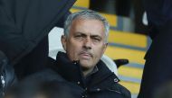 Manchester United's Portuguese manager Jose Mourinho (C) sits in the stands ahead of the English Premier League football match between Swansea City and Manchester United at The Liberty Stadium in Swansea, south Wales on November 6, 2016. / AFP / GEOFF CAD