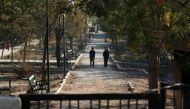 Men walk in a public park in a rebel-held besieged area in Aleppo, Syria November 6, 2016. REUTERS/Abdalrhman Ismail

