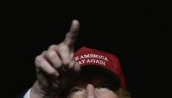  US Republican presidential nominee Donald Trump addresses a campaign rally at Atlantic Aviation in Moon Township, Pennsylvania on November 6, 2016. / AFP / MANDEL NGAN