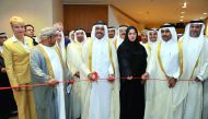 H E Dr Mohammed bin Saleh Al Sada, the Minister of Energy and Industry cutting a ribbon with  Essa bin Hilal Al-Kuwari, the President of Qatar General Electricity & Water Corporation and other officials to mark the opening of GCC Power 2016 forum and exhi
